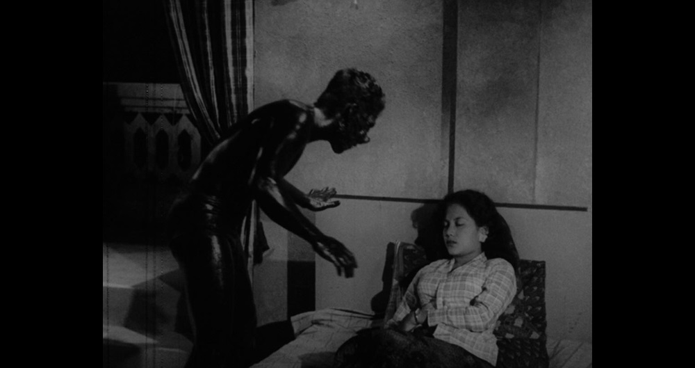 Still from 'Orang Minyak' (Film source: Asian Film Archive. Courtesy of ©Cathay-Keris Film Pte. Ltd.)    