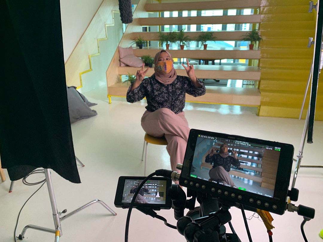 Kai during the filming of the Project Happiness video.