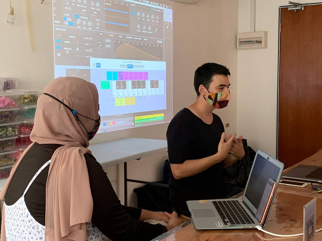 Kai and the artist Zai Tang.